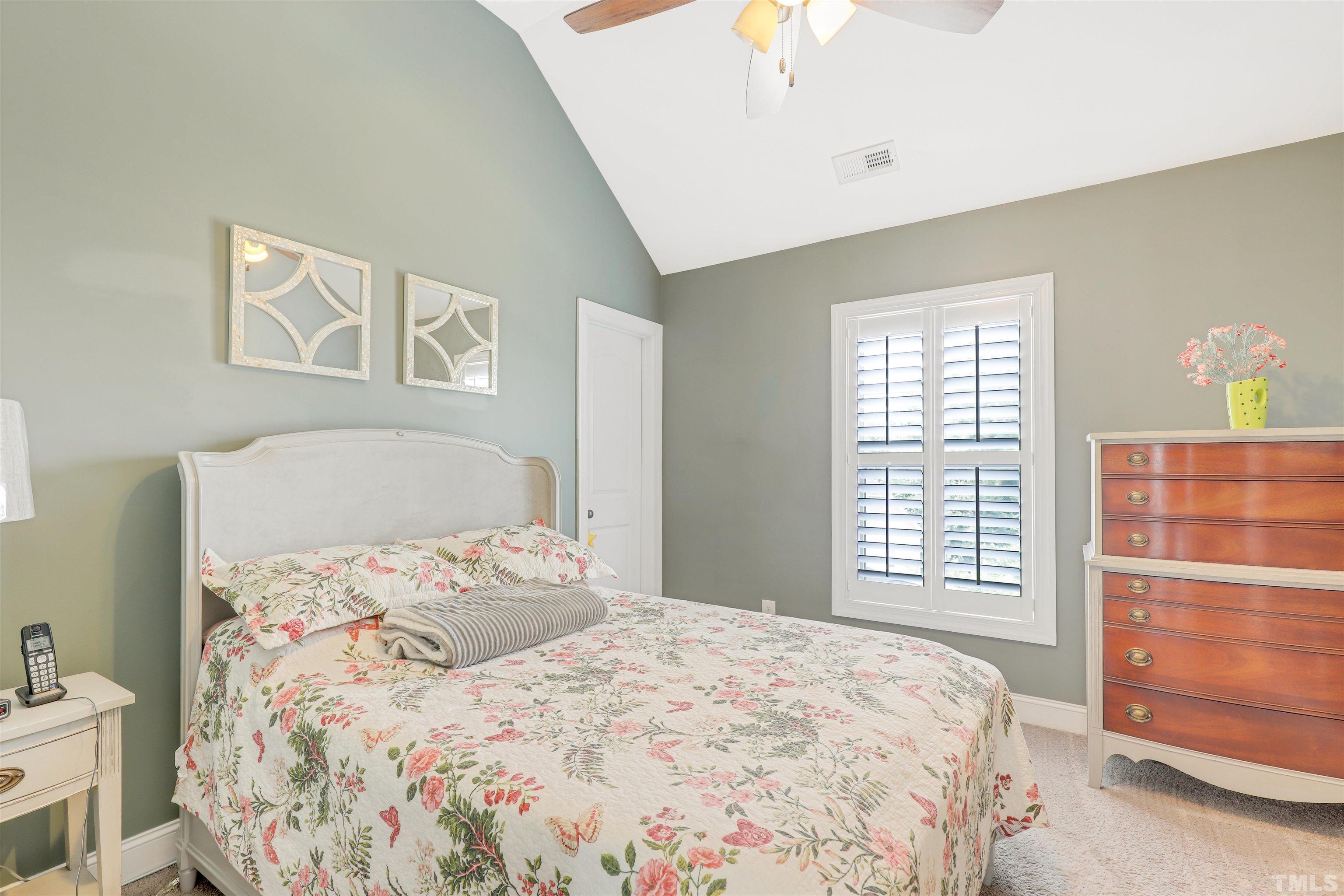 4312 Glengrove Road Raleigh, NC 27616 - Photo 30 of 50 a bedroom with a bed and a window