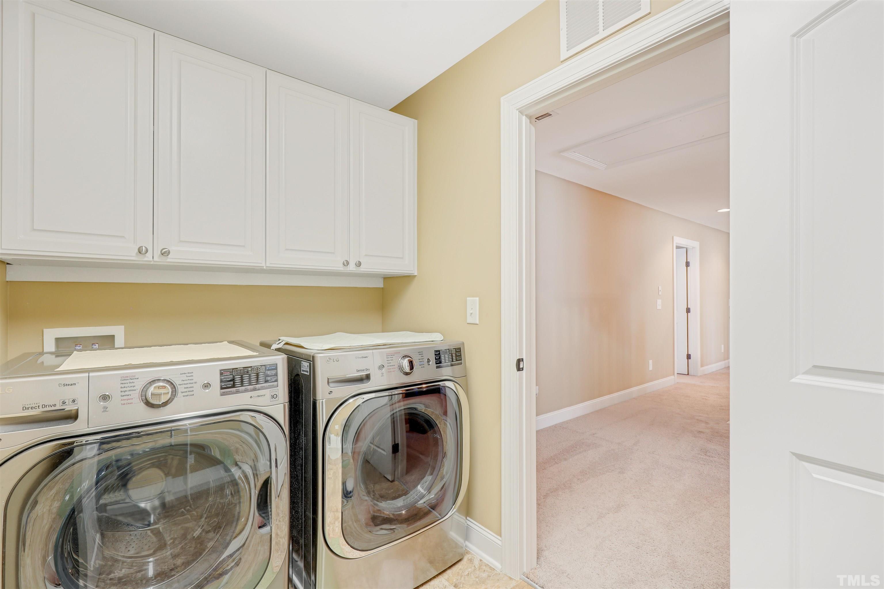 4312 Glengrove Road Raleigh, NC 27616 - Photo 34 of 50 a utility room with dryer and washer