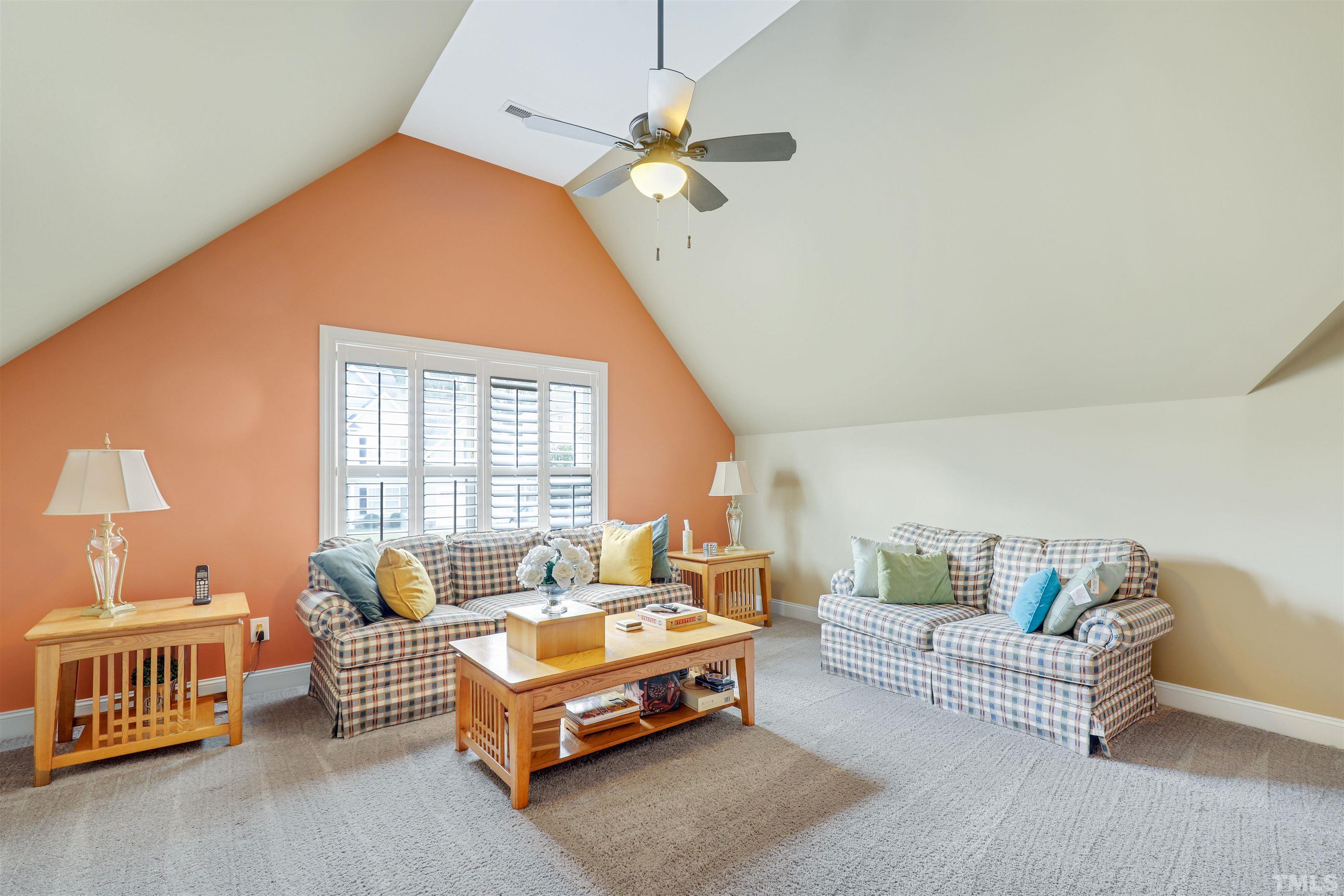 4312 Glengrove Road Raleigh, NC 27616 - Photo 35 of 50 a living room with furniture and a table