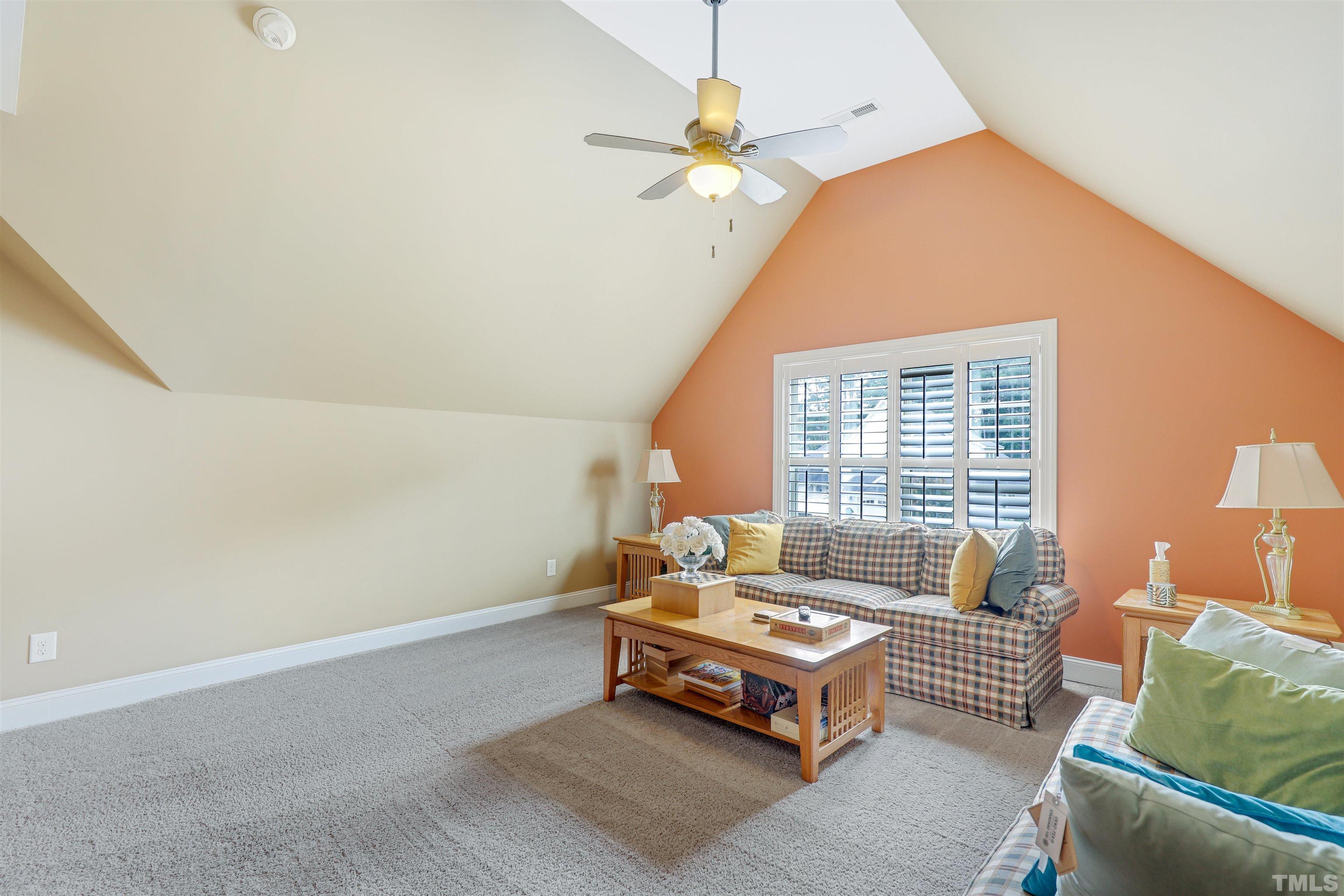 4312 Glengrove Road Raleigh, NC 27616 - Photo 36 of 50 a bedroom with furniture and a chandelier