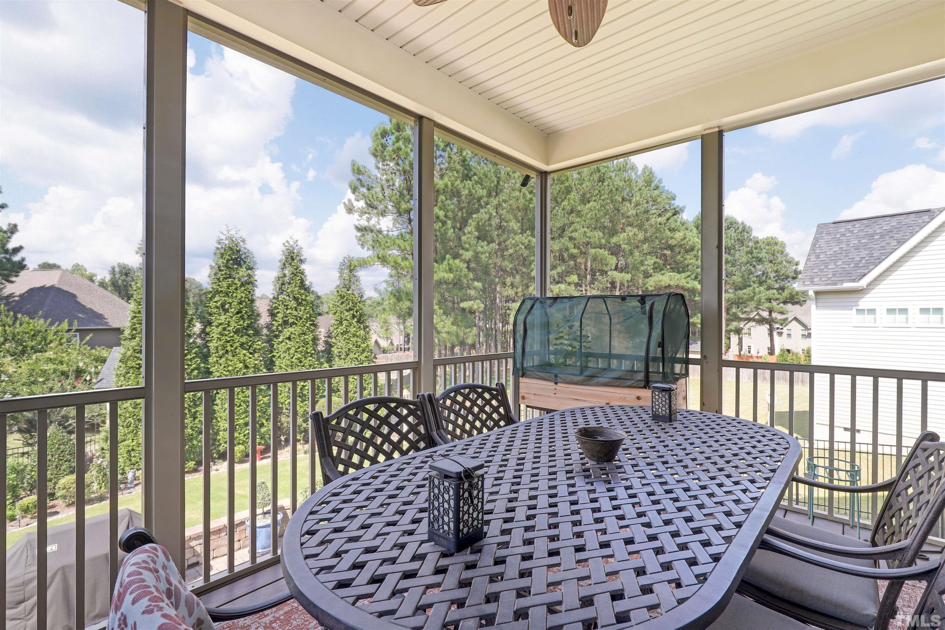 4312 Glengrove Road Raleigh, NC 27616 - Photo 40 of 50 a view of a chair in wooden deck