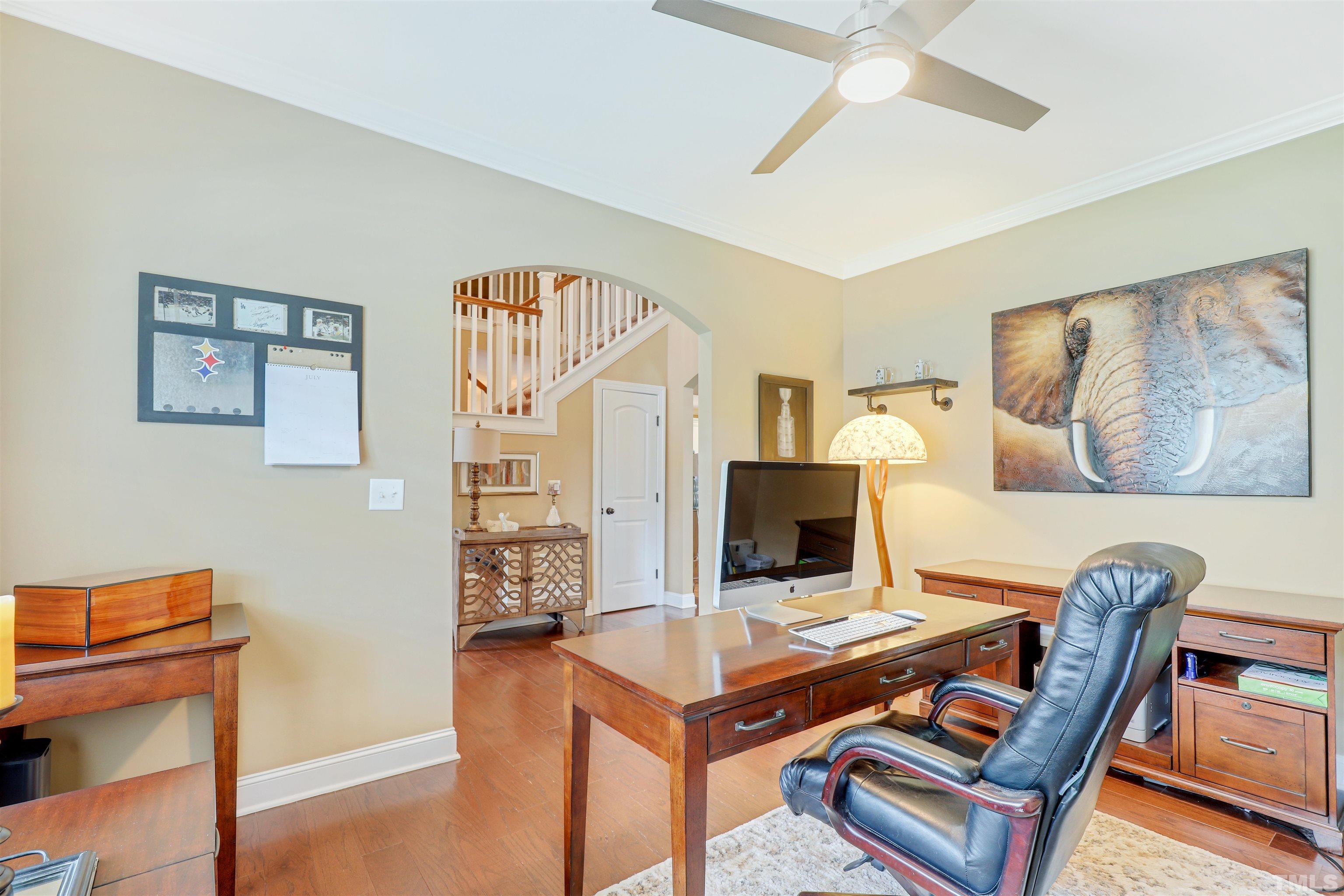 4312 Glengrove Road Raleigh, NC 27616 - Photo 4 of 50 a living room with furniture and a flat screen tv