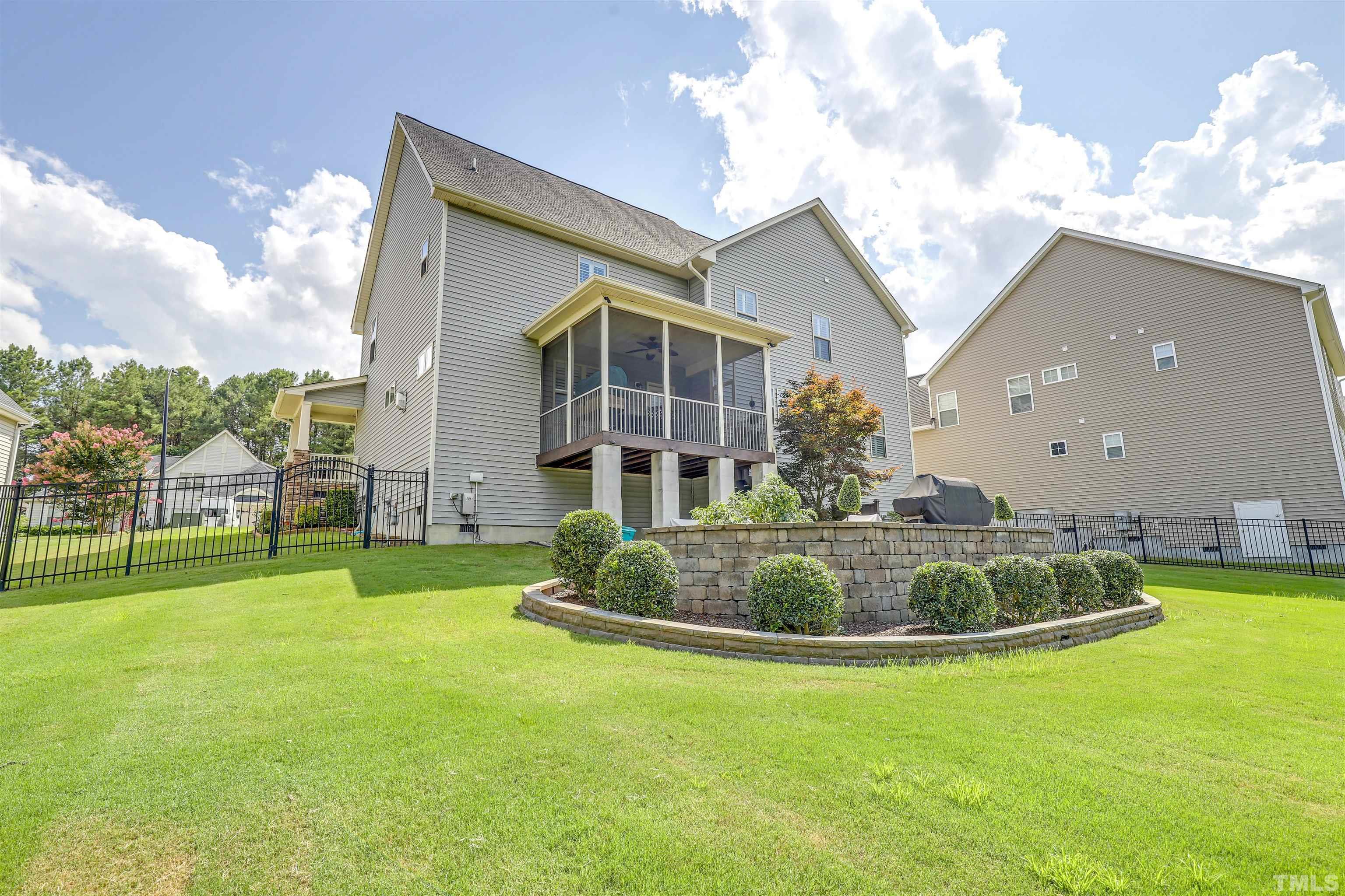 4312 Glengrove Road Raleigh, NC 27616 - Photo 44 of 50 a view of a house with a backyard
