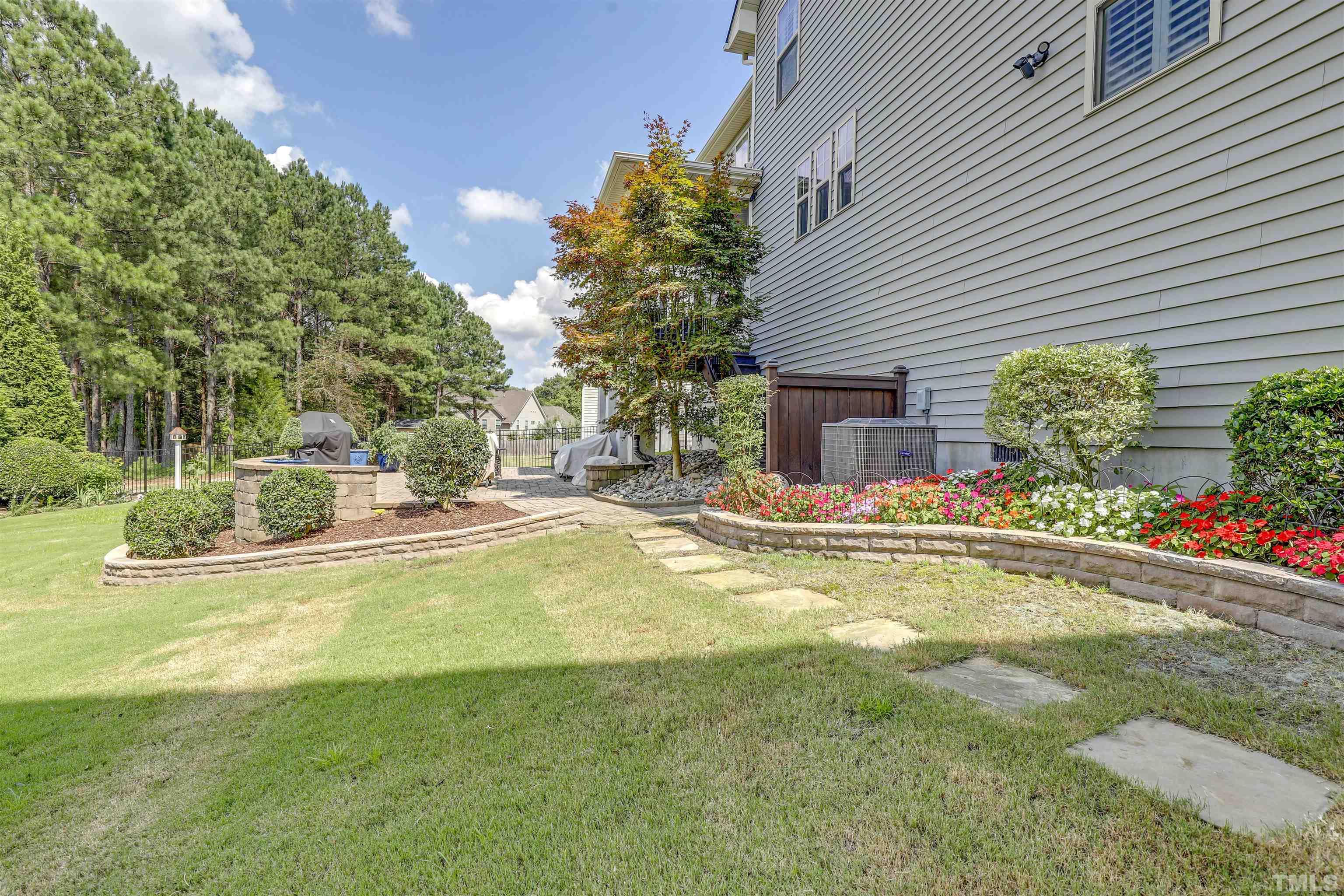 4312 Glengrove Road Raleigh, NC 27616 - Photo 49 of 50 a view of swimming pool with outdoor seating and plants