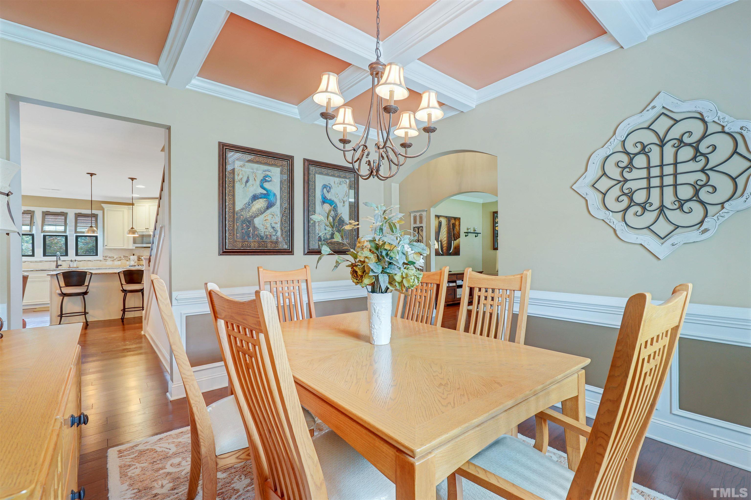 4312 Glengrove Road Raleigh, NC 27616 - Photo 6 of 50 a view of a dining room with furniture and chandelier