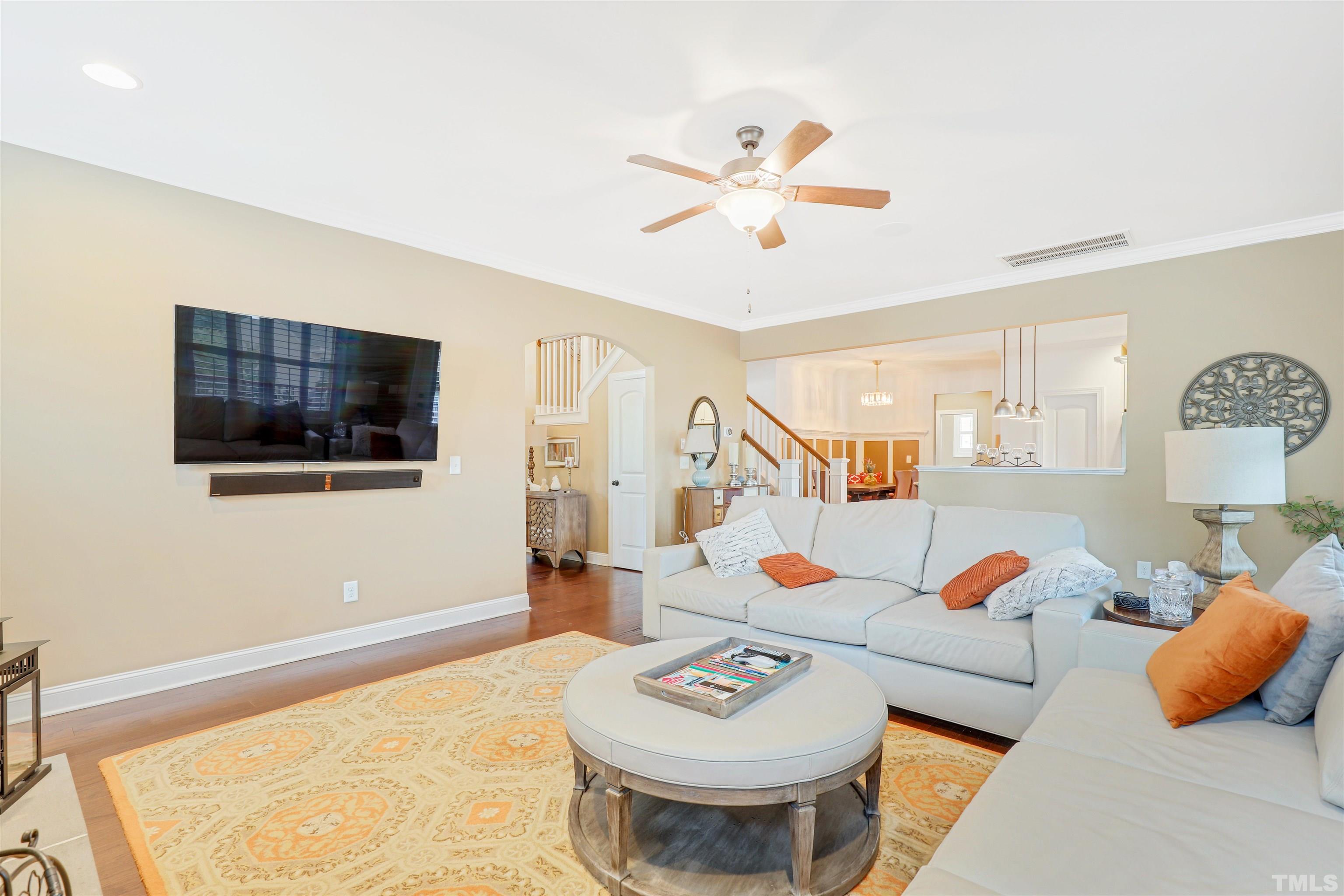4312 Glengrove Road Raleigh, NC 27616 - Photo 8 of 50 a living room with furniture and a flat screen tv