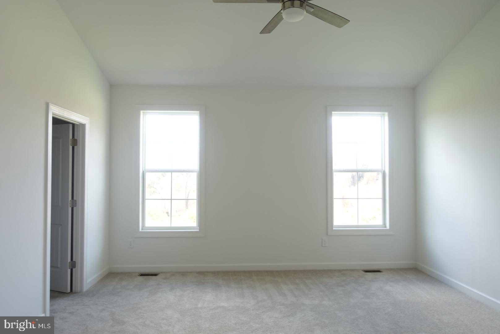 310 Steeple View Drive, Unit 18 Hanover, PA 17331 - Photo 11 of 24 an empty room with windows
