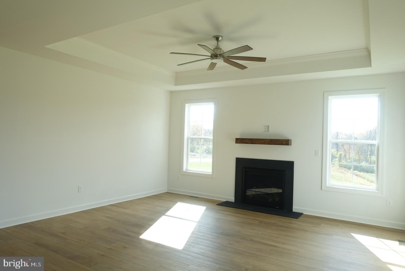 310 Steeple View Drive, Unit 18 Hanover, PA 17331 - Photo 6 of 24 a view of an empty room with window and fire place