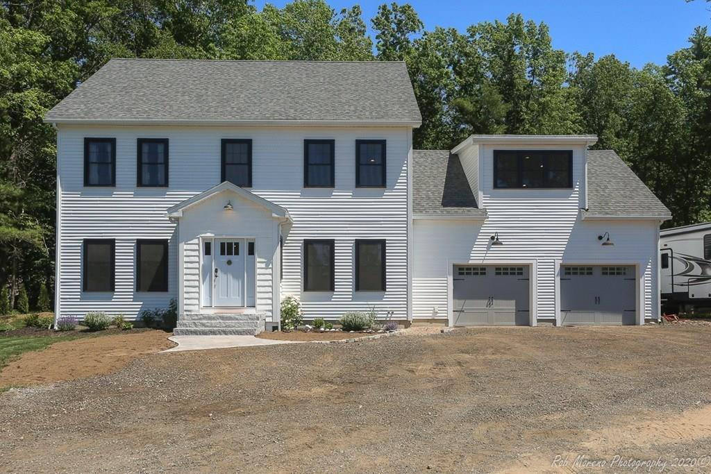 30 Folly Mill Road Salisbury, MA 01952 - Photo 1 of 42 a view of a house with a garage