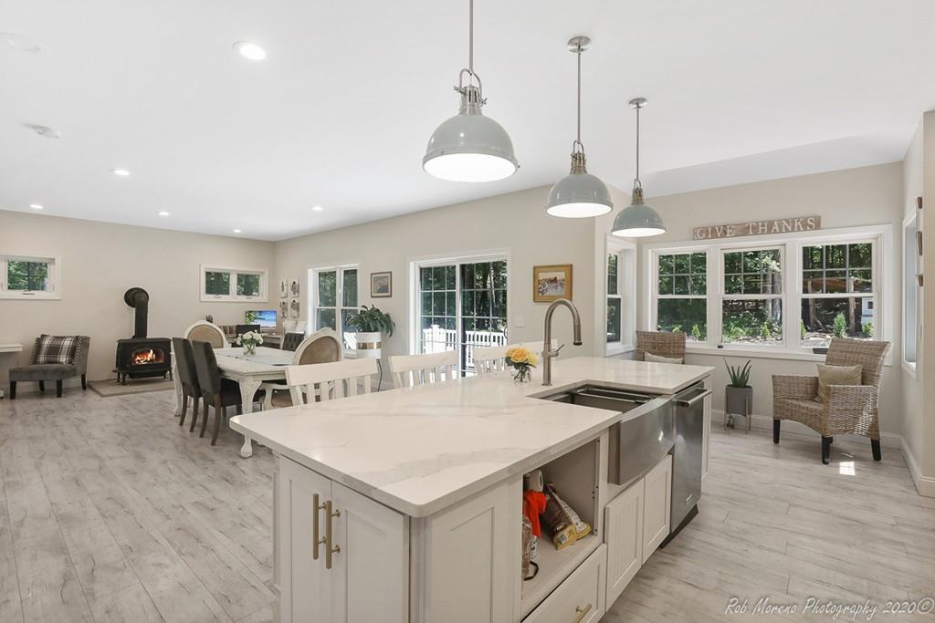30 Folly Mill Road Salisbury, MA 01952 - Photo 13 of 42 a open kitchen with stainless steel appliances granite countertop a sink and stove
