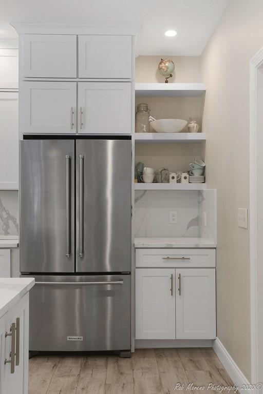 30 Folly Mill Road Salisbury, MA 01952 - Photo 17 of 42 a white refrigerator freezer sitting in a kitchen