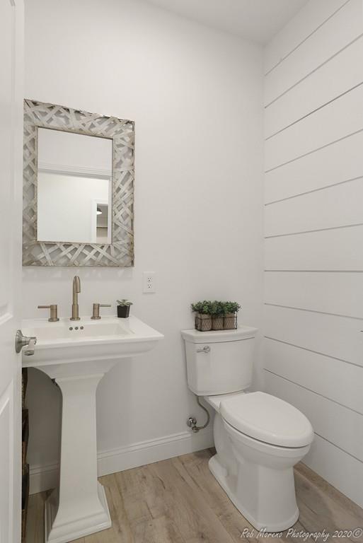 30 Folly Mill Road Salisbury, MA 01952 - Photo 20 of 42 a bathroom with a toilet a sink and mirror