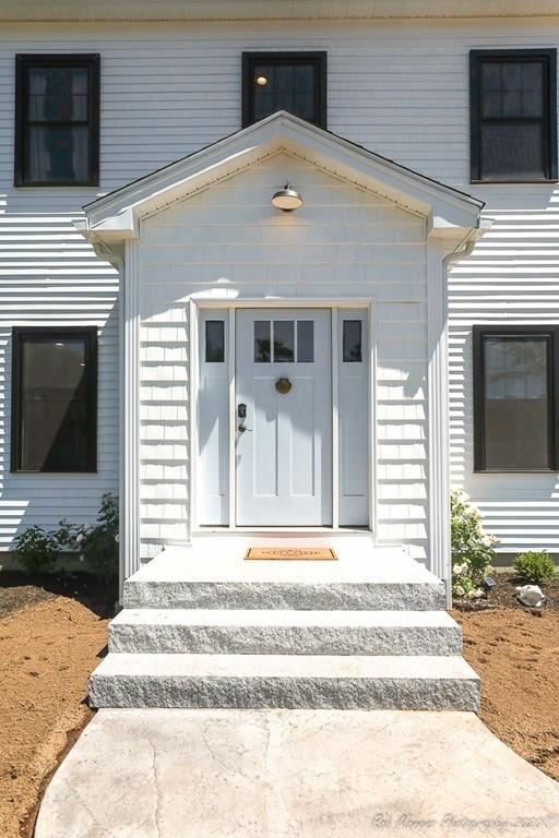30 Folly Mill Road Salisbury, MA 01952 - Photo 2 of 42 a front view of a house with a outdoor space