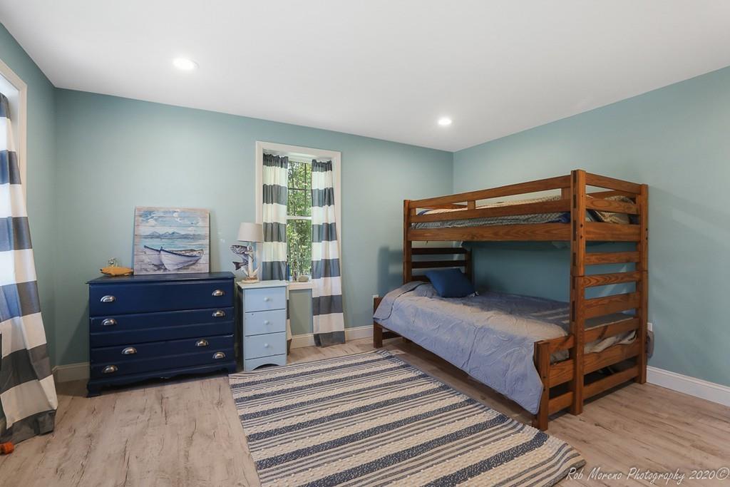 30 Folly Mill Road Salisbury, MA 01952 - Photo 22 of 42 a bedroom with a bed and a window