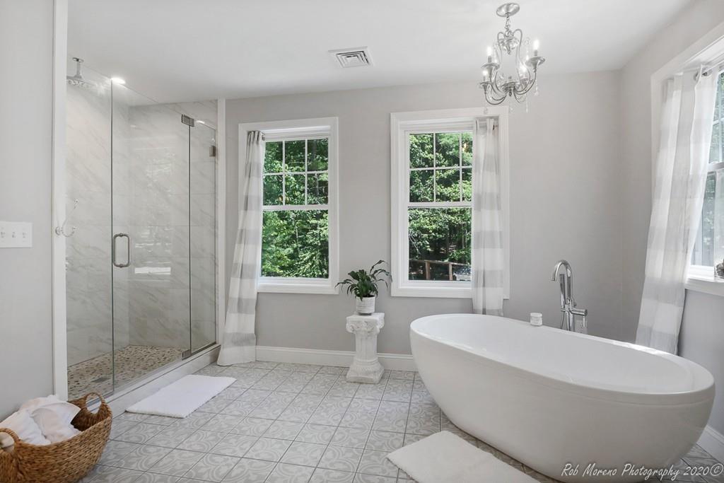 30 Folly Mill Road Salisbury, MA 01952 - Photo 28 of 42 a bathroom with a bathtub and shower