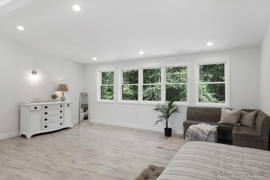 30 Folly Mill Road Salisbury, MA 01952 - Photo 32 of 42 a living room with furniture and windows