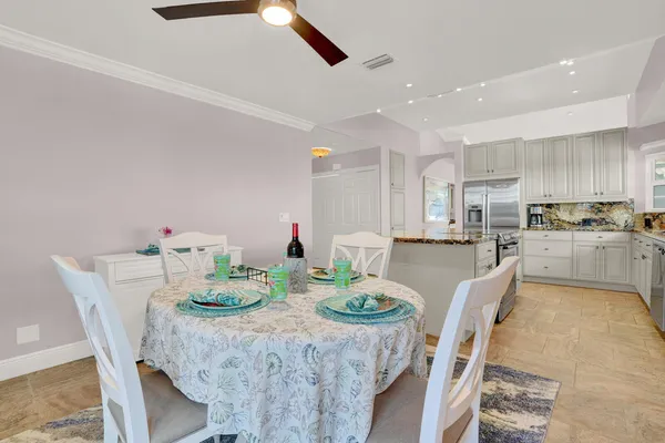 a kitchen with stainless steel appliances granite countertop a sink and cabinets
