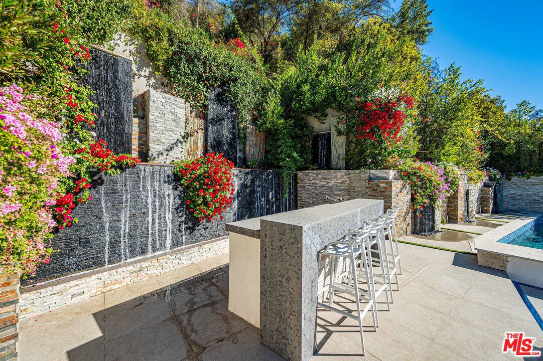 930 Roscomare Road Los Angeles, CA 90077 - Photo 12 of 54 a view of outdoor space yard and patio