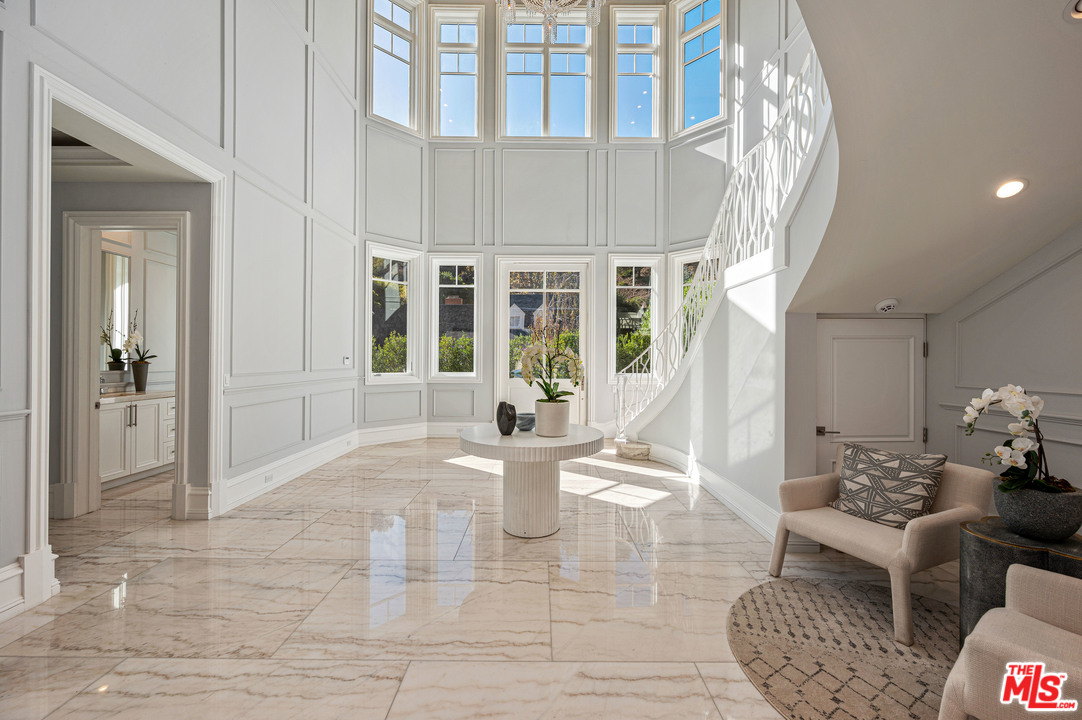930 Roscomare Road Los Angeles, CA 90077 - Photo 24 of 54 a view of a living room and dining room