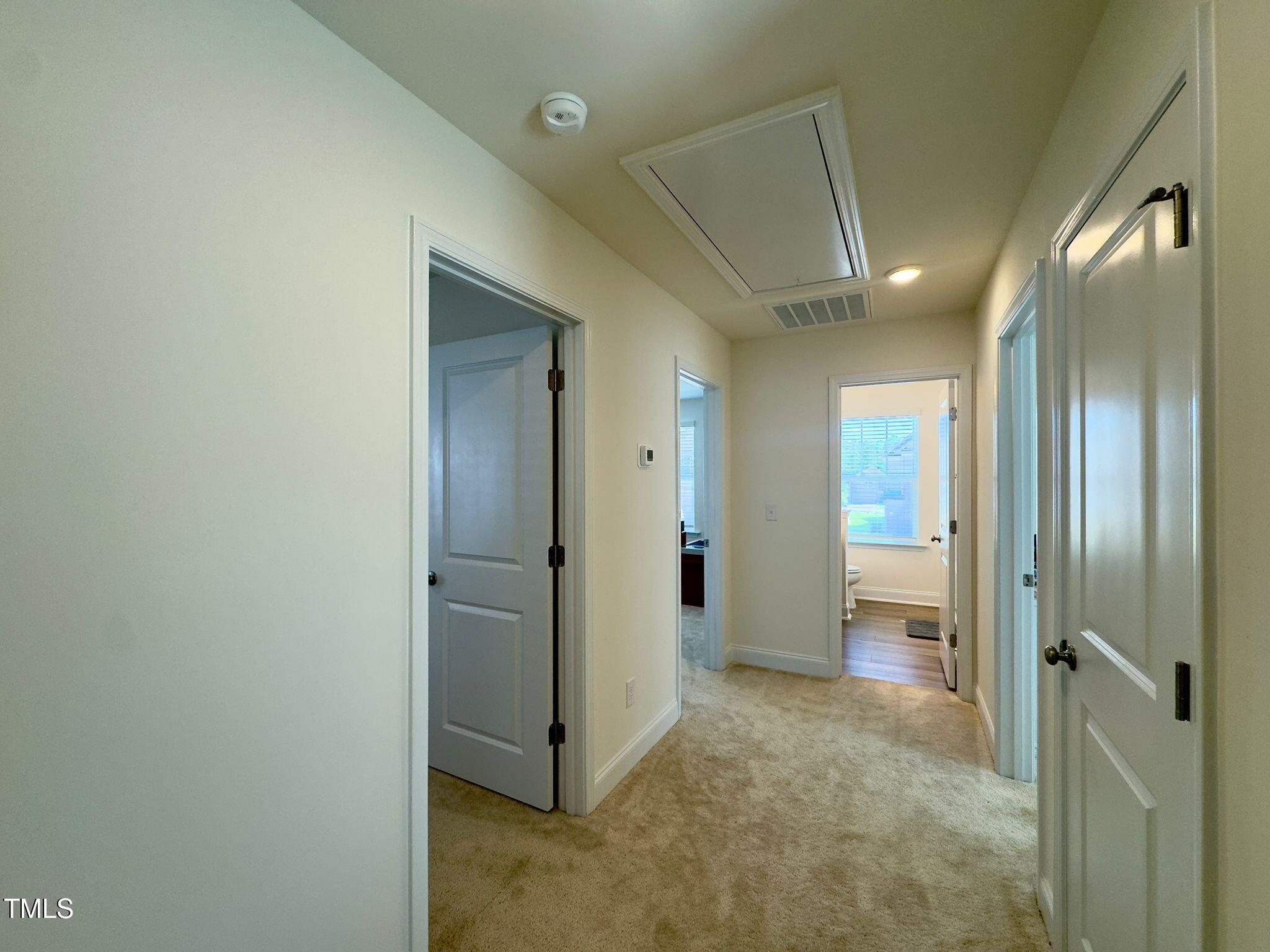 47 Flowing River Road Angier, NC 27501 - Photo 22 of 38 a view of a hallway with closet area