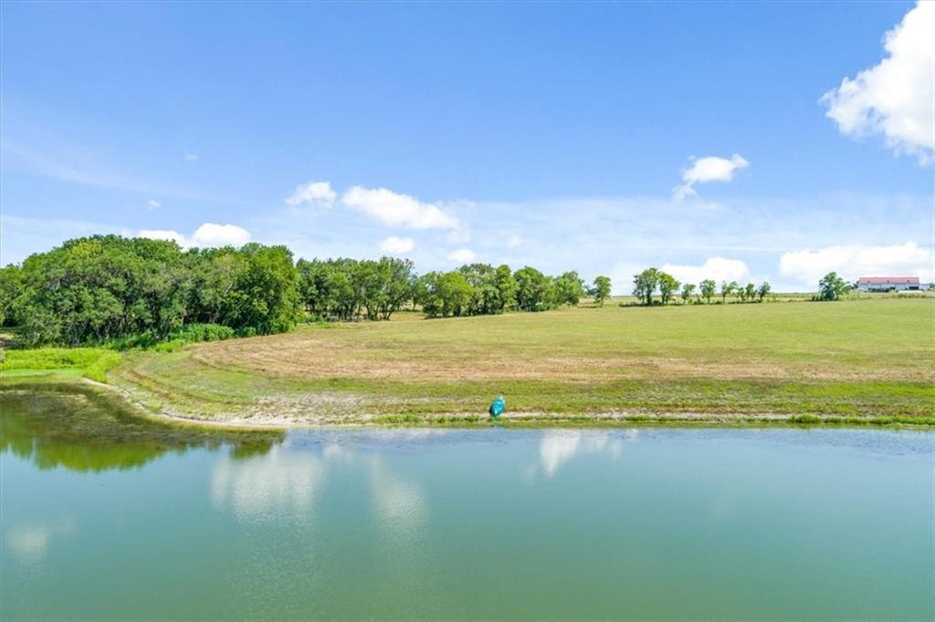 600 Tynes Road Lorena, TX 76655 - Photo 8 of 12 a view of a lake and a yard