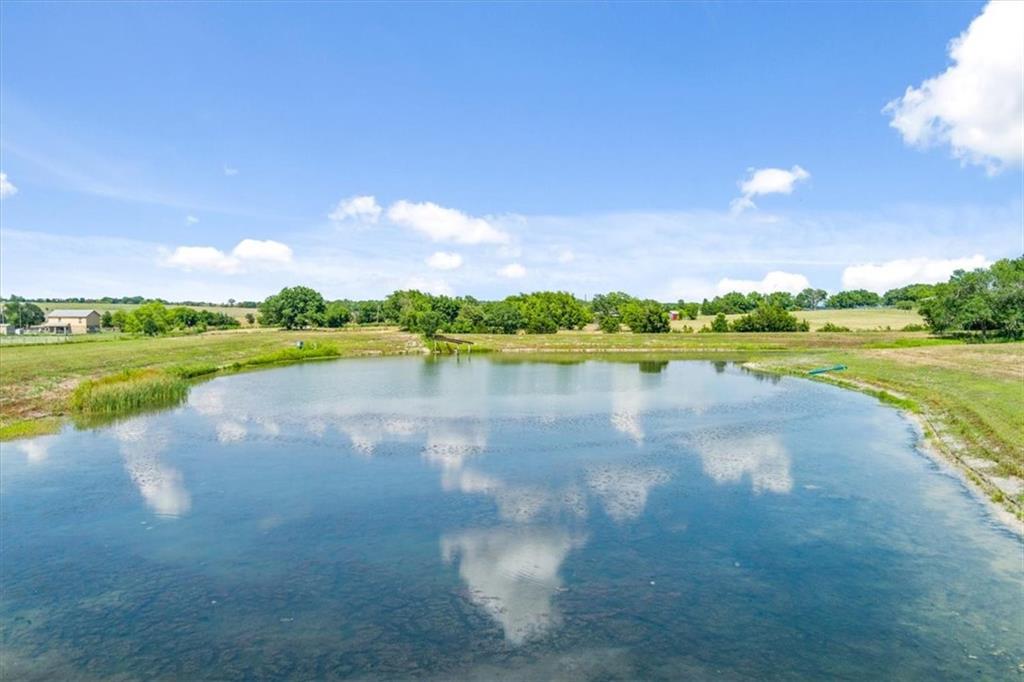 600 Tynes Road Lorena, TX 76655 - Photo 9 of 12 a view of a lake with a big yard