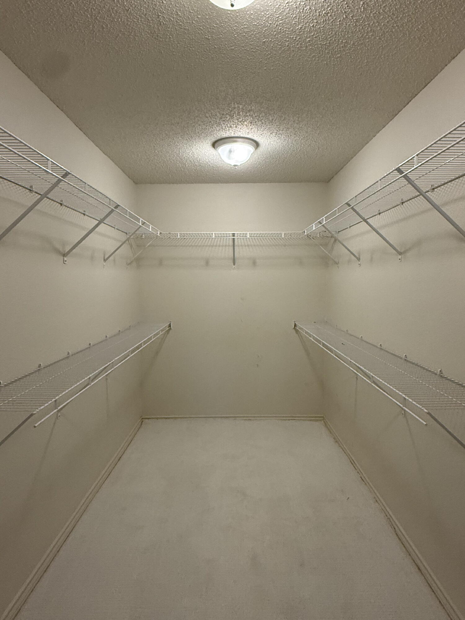 3607 Gary Avenue Lubbock, TX 79413 - Photo 13 of 26 a view of a room with racks on the wall