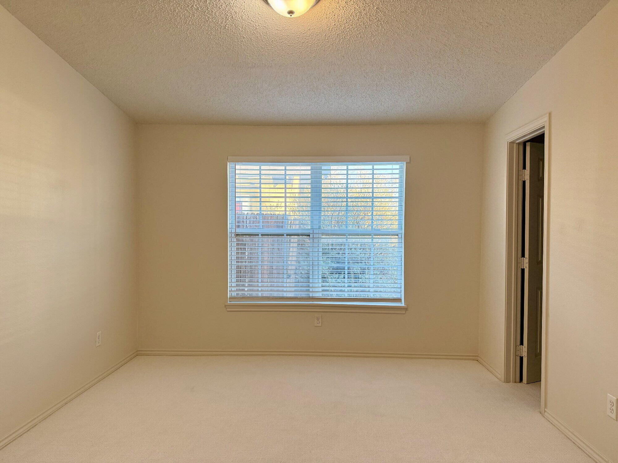 3607 Gary Avenue Lubbock, TX 79413 - Photo 20 of 26 an empty room with a window