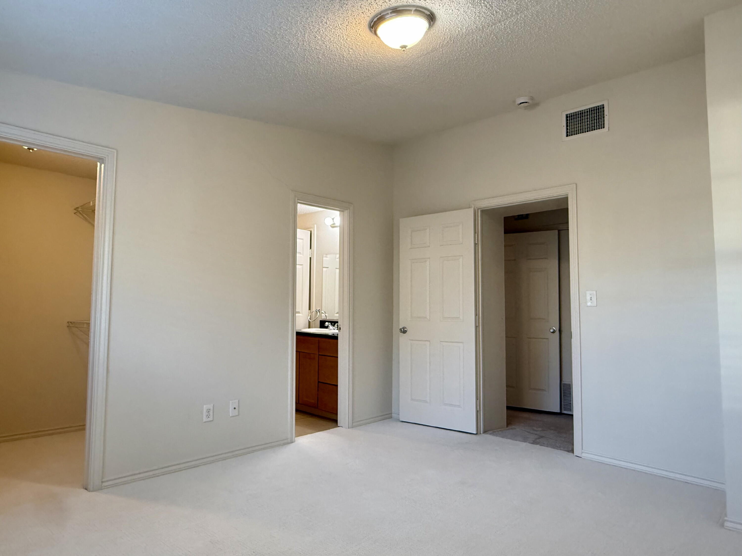 3607 Gary Avenue Lubbock, TX 79413 - Photo 21 of 26 an empty room with closet and a bathroom