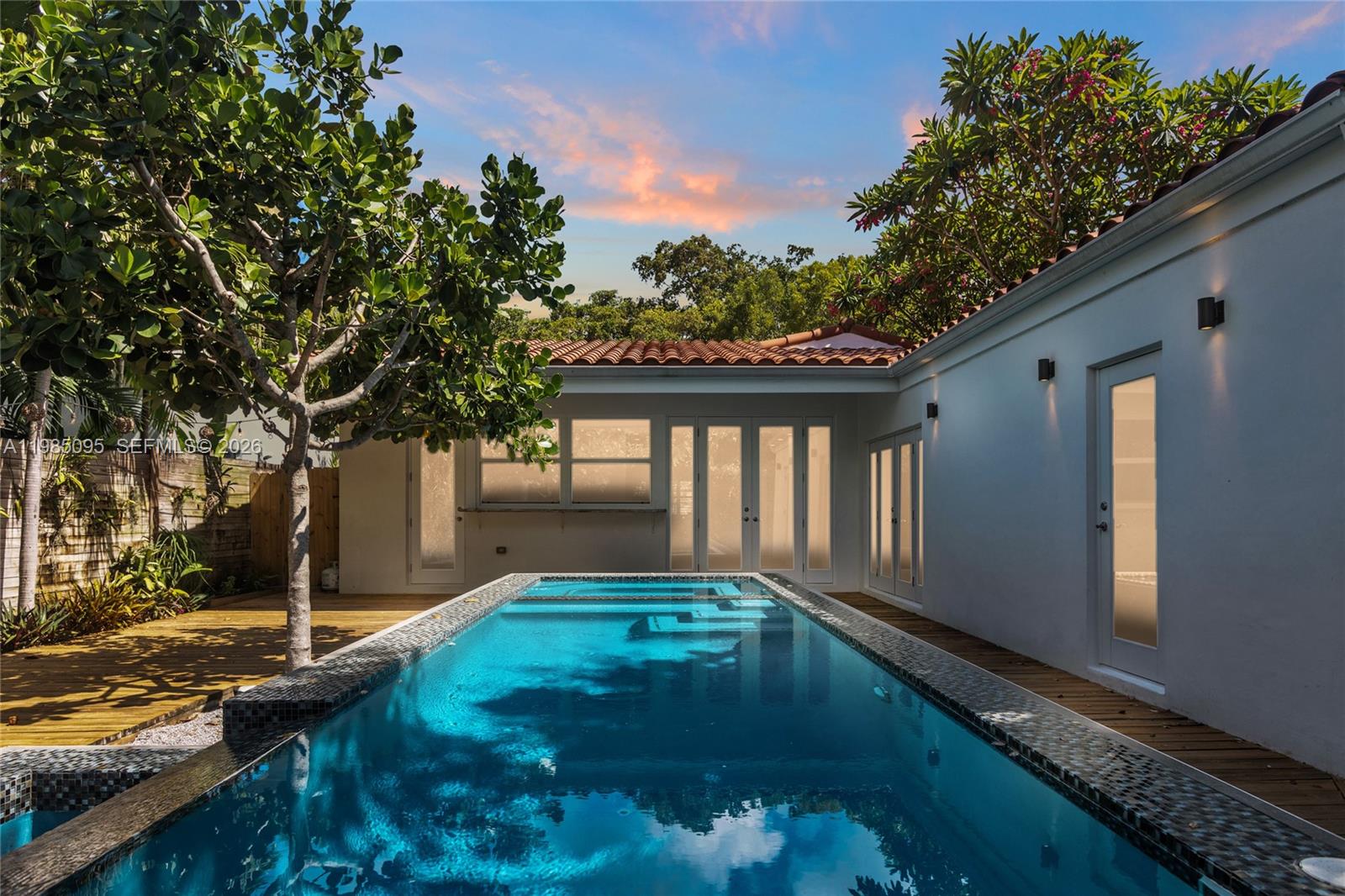 776 Northeast 74th Street Miami, FL 33138 - Photo 1 of 40 a view of swimming pool with a yard