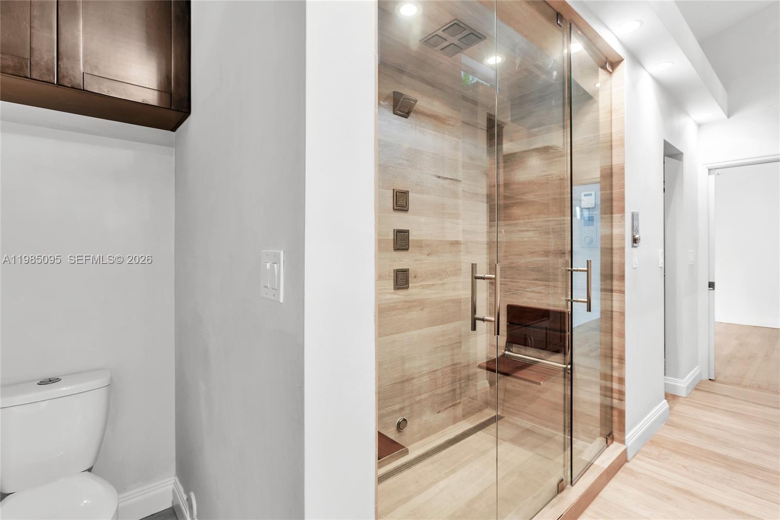 776 Northeast 74th Street Miami, FL 33138 - Photo 30 of 40 a bathroom with a shower and toilet
