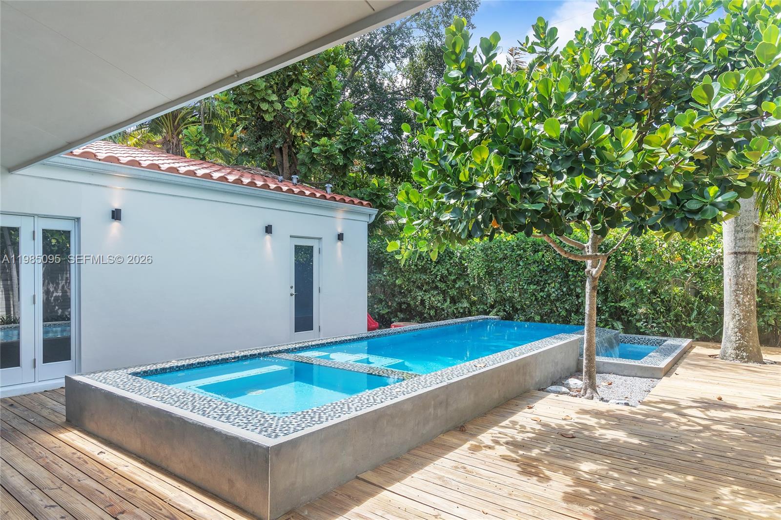 776 Northeast 74th Street Miami, FL 33138 - Photo 39 of 40 a view of a pool with a outdoor space