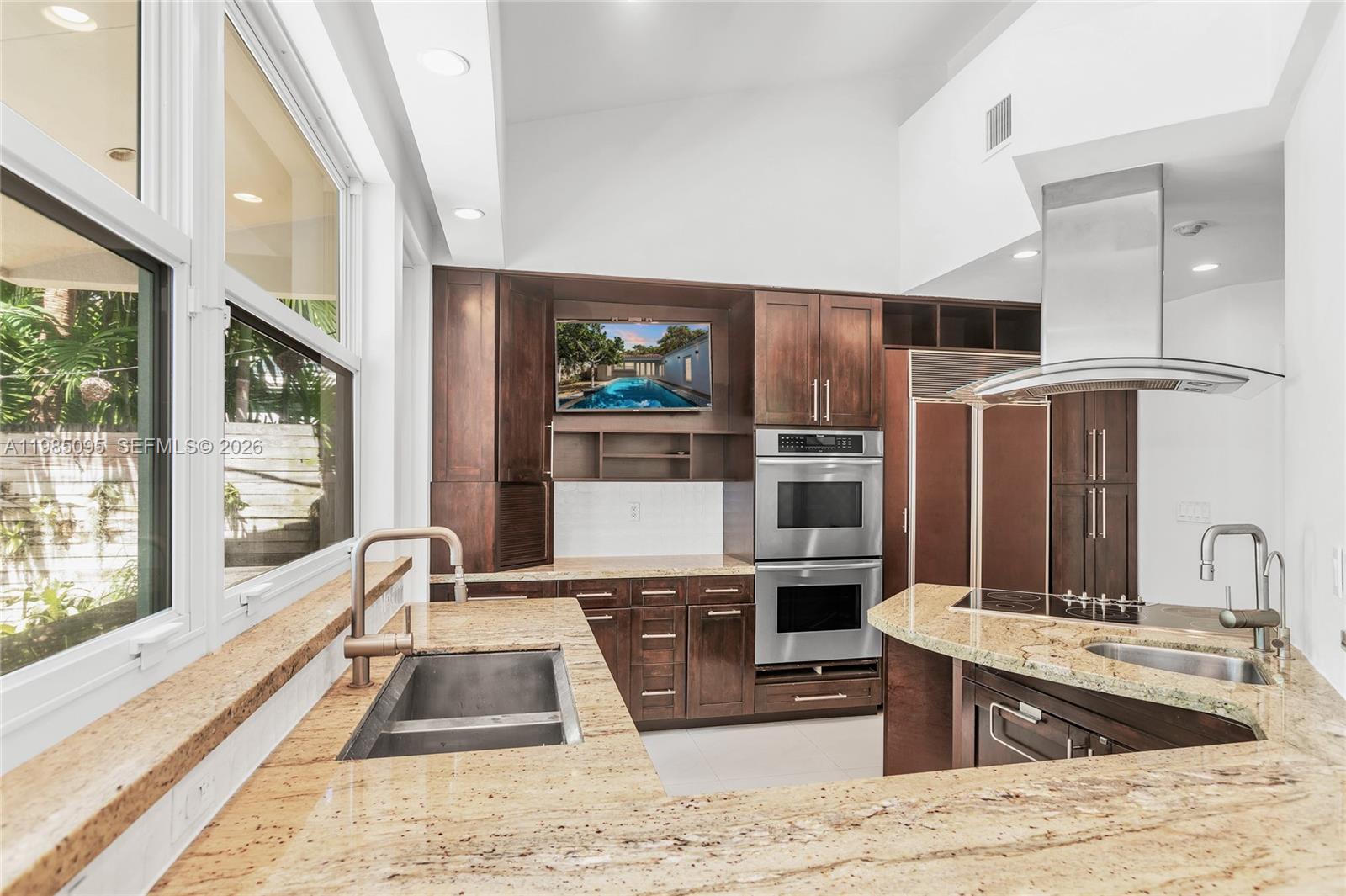 776 Northeast 74th Street Miami, FL 33138 - Photo 9 of 40 a view of kitchen with sink and window