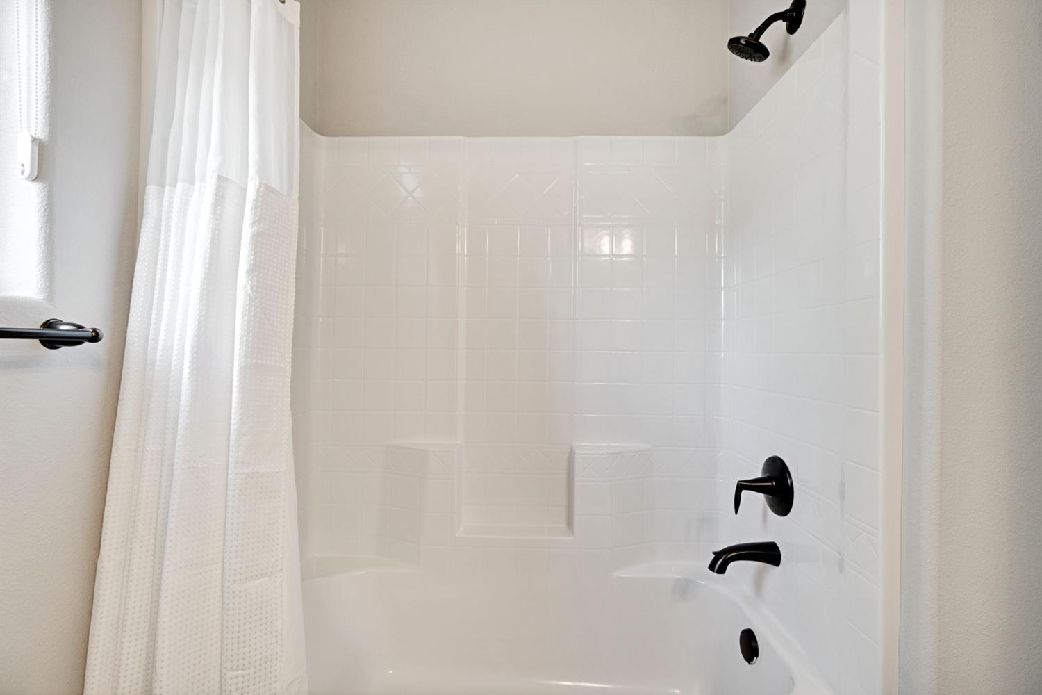 4415 Horizon Drive Madera, CA 93636 - Photo 20 of 41 a bathroom with a shower