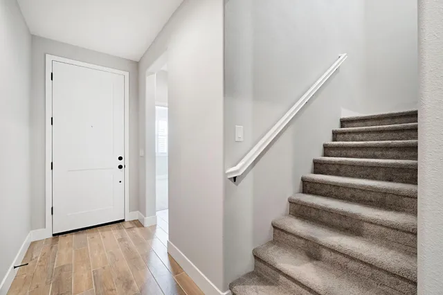 a view of entryway with wooden floor