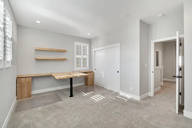 a view of a livingroom with a furniture