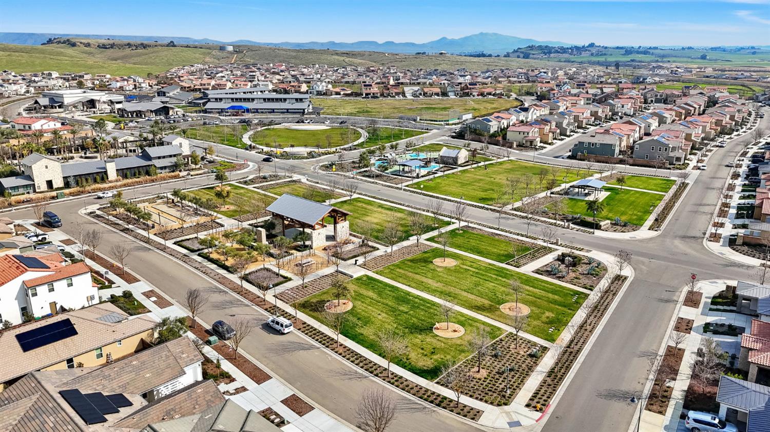 4415 Horizon Drive Madera, CA 93636 - Photo 40 of 41 an aerial view of a tennis ground and a city view