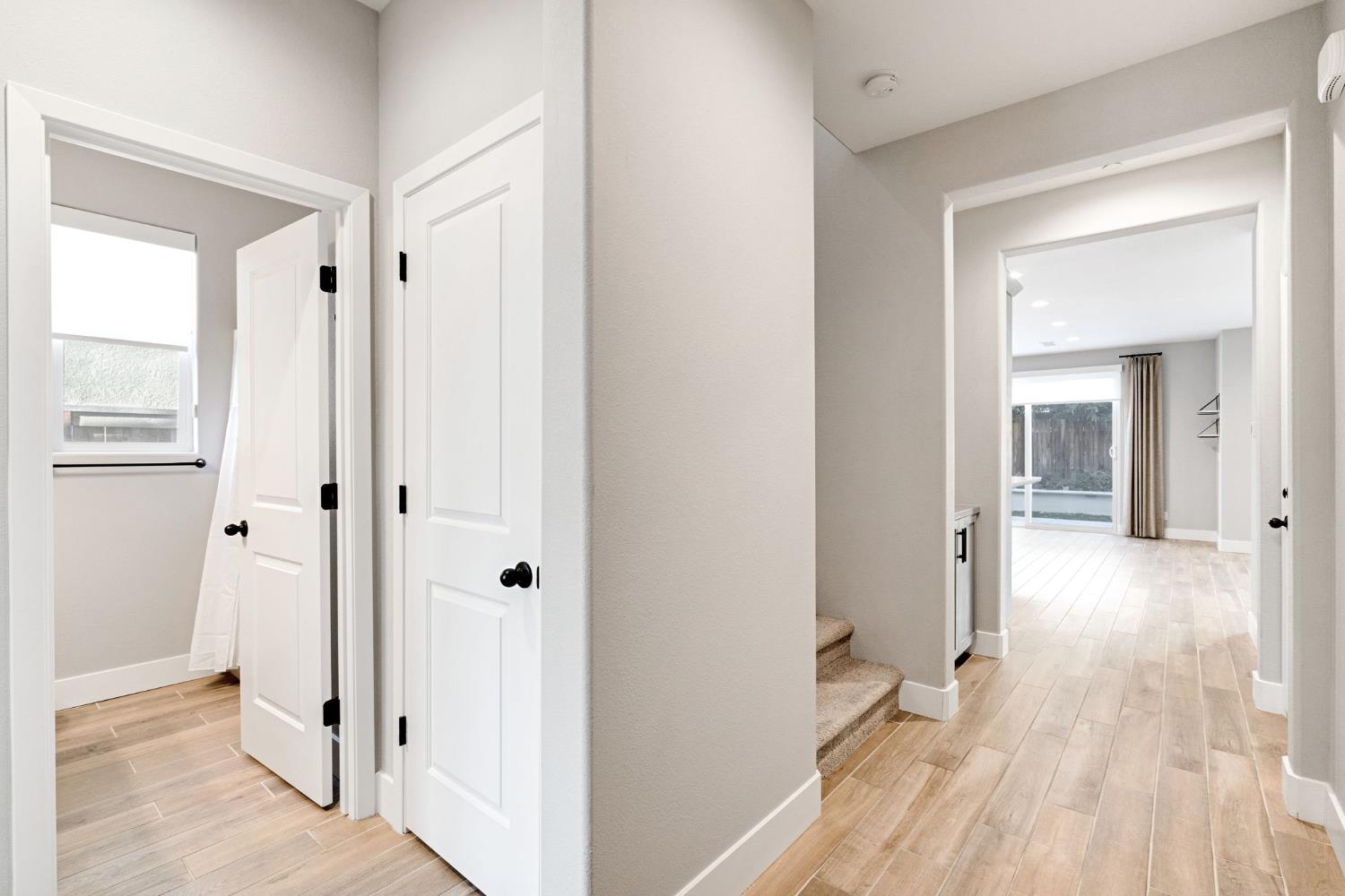 4415 Horizon Drive Madera, CA 93636 - Photo 5 of 41 a view of a hallway with wooden floor and closet area