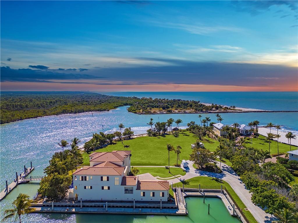100 Bay Road Naples, FL 34102 - Photo 5 of 12 Drone / aerial view of unending shoreline