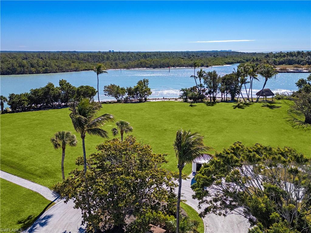 100 Bay Road Naples, FL 34102 - Photo 7 of 12 Drone / aerial view of extended coastline
