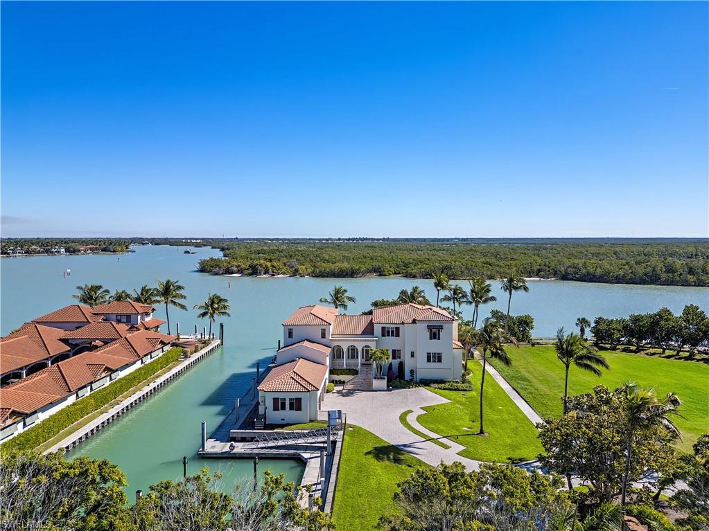 100 Bay Road Naples, FL 34102 - Photo 9 of 12 Drone / aerial view of unending shoreline