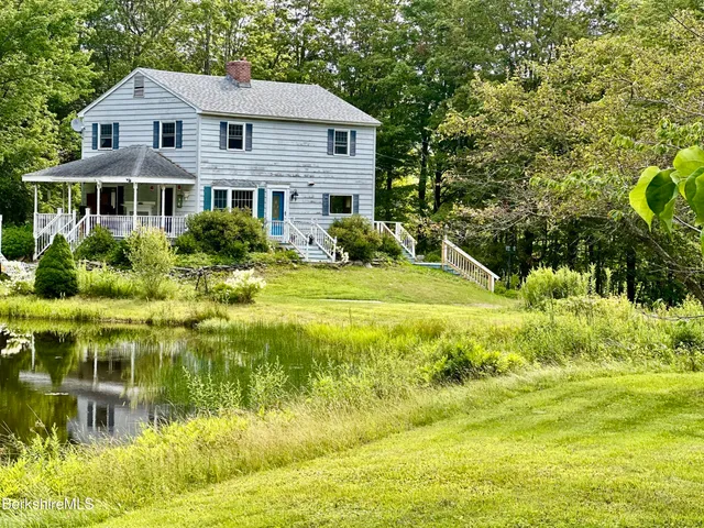 a front view of a house with swimming pool