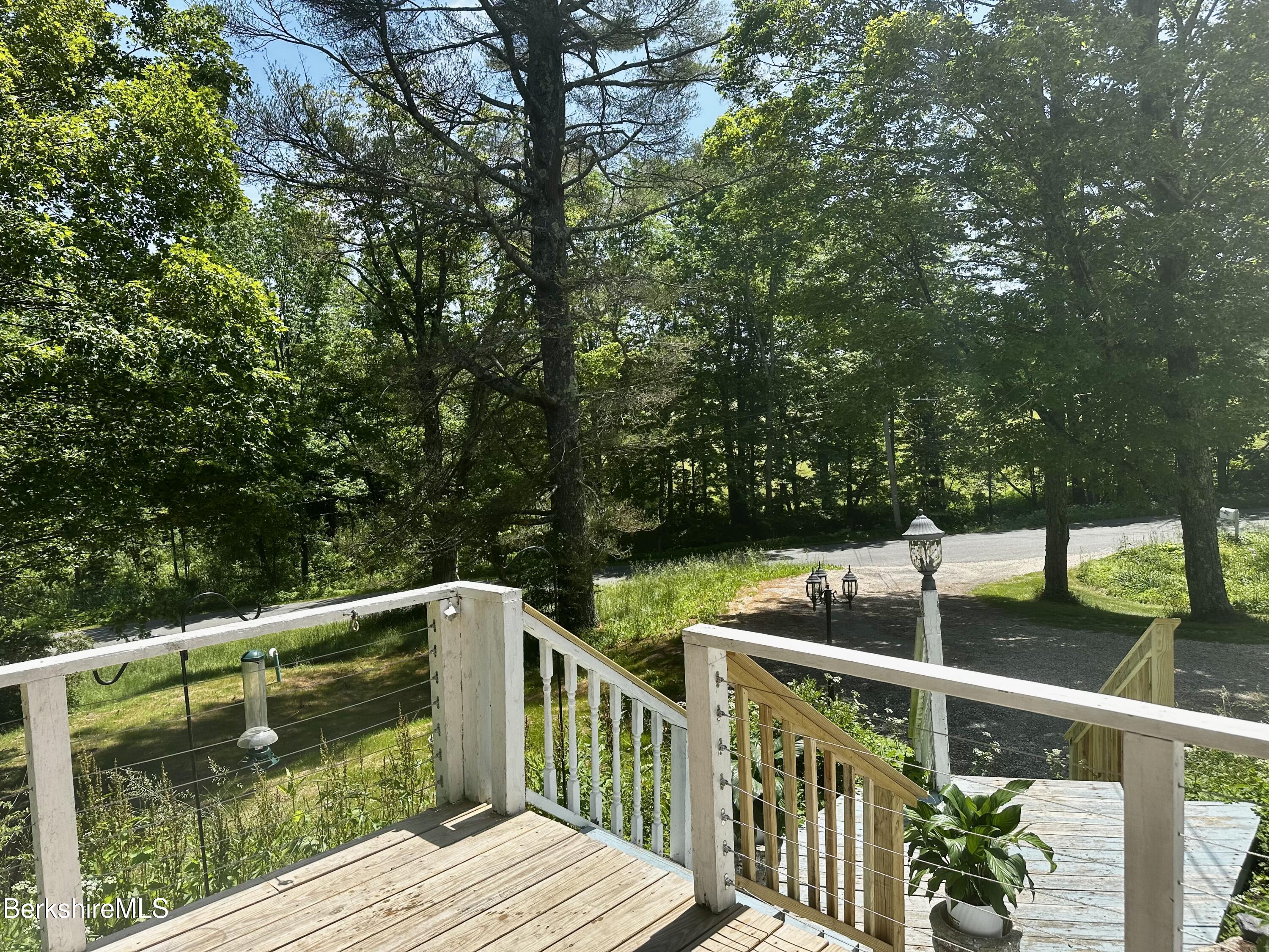 1689 East Windsor Road Windsor, MA 01270 - Photo 17 of 57 a view of balcony with wooden floor and fence