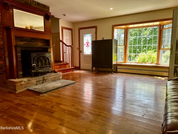 a room with furniture and a window