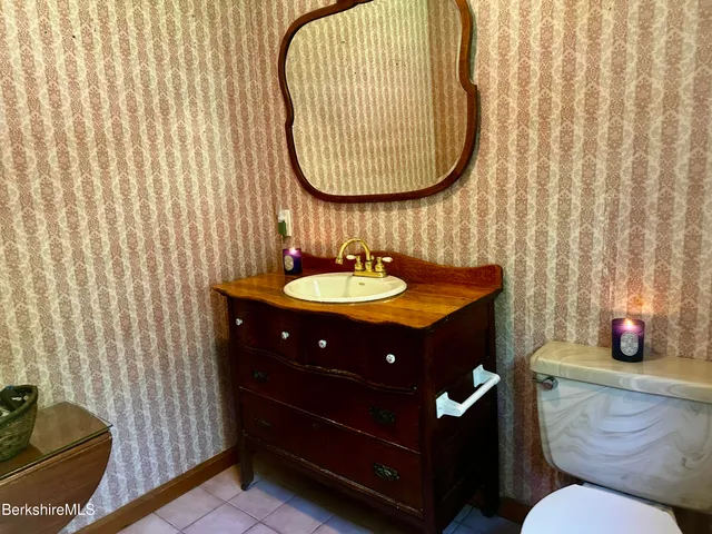 a view of a lake with a yard