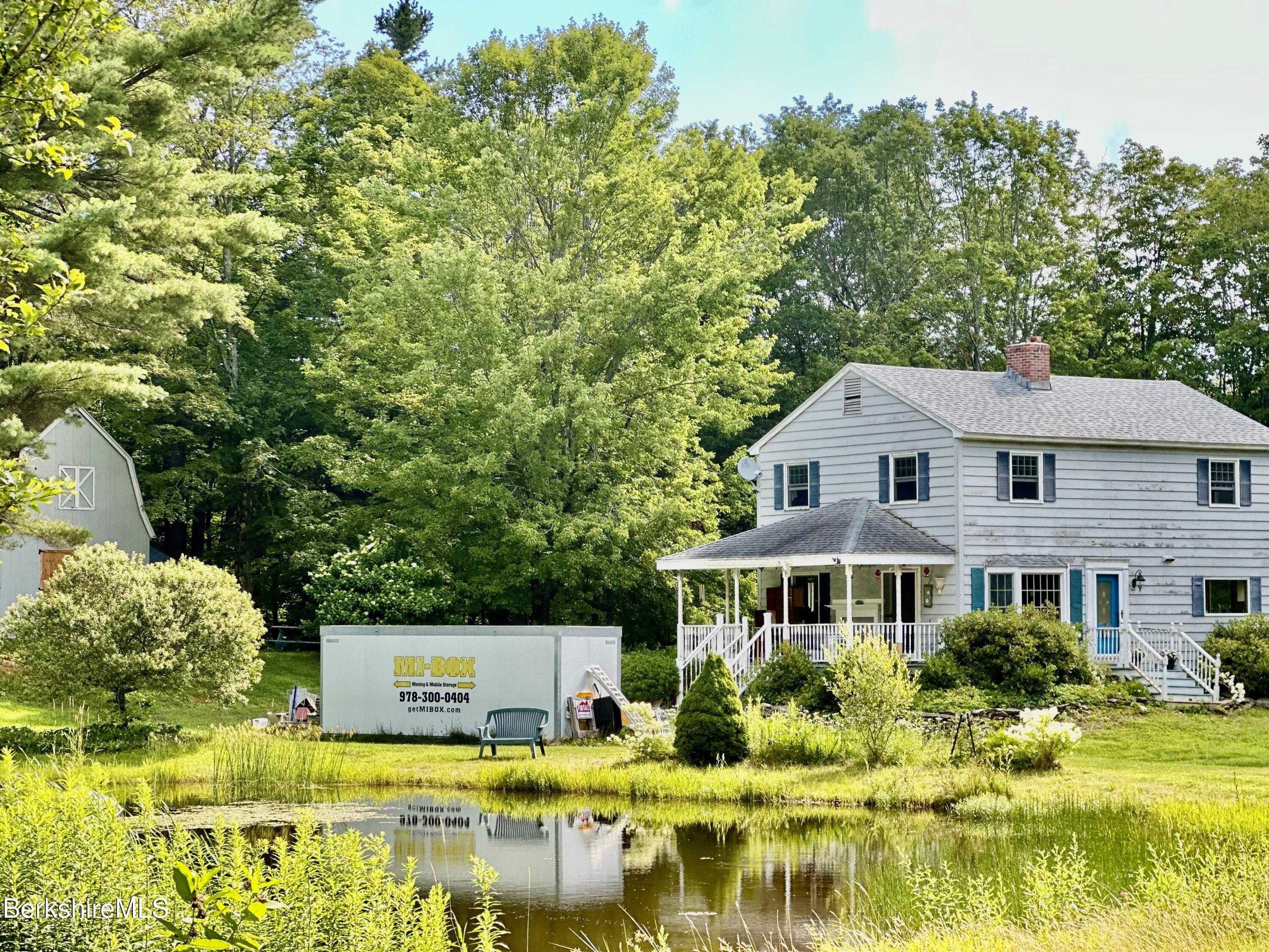 1689 East Windsor Road Windsor, MA 01270 - Photo 3 of 57 a front view of a house with swimming pool
