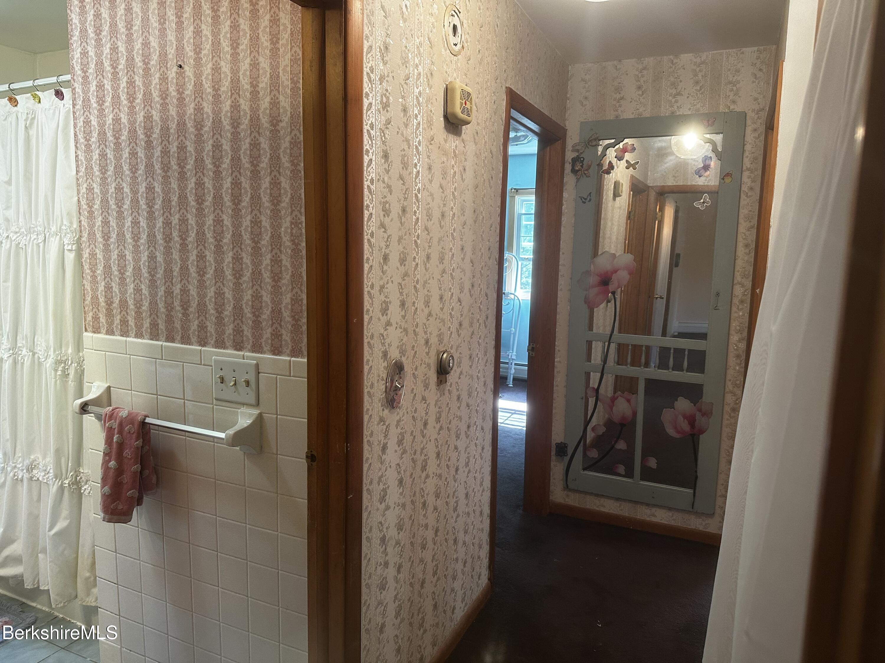 1689 East Windsor Road Windsor, MA 01270 - Photo 43 of 57 a bathroom with a glass shower door