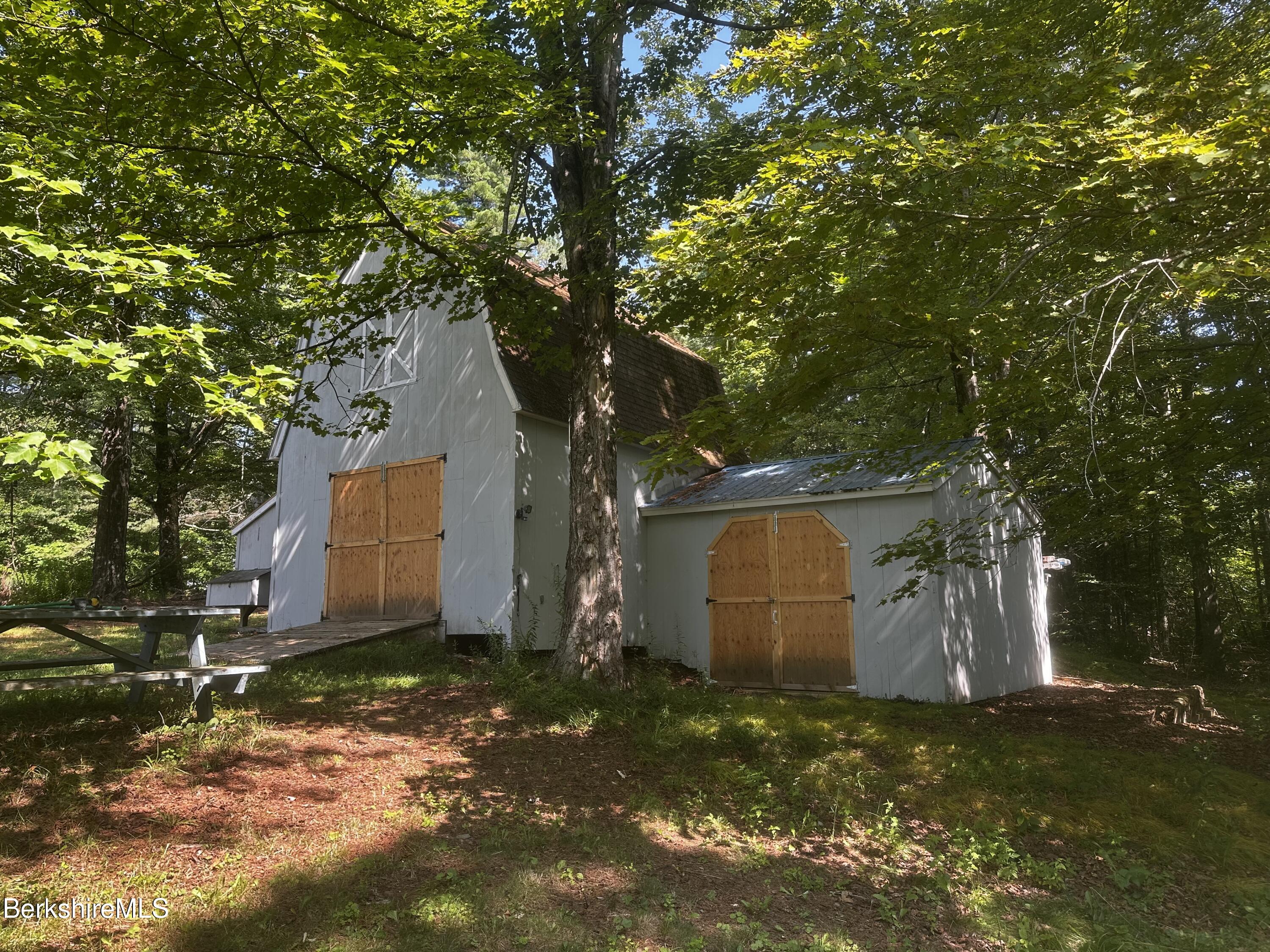 1689 East Windsor Road Windsor, MA 01270 - Photo 50 of 57 a backyard of house with a tree