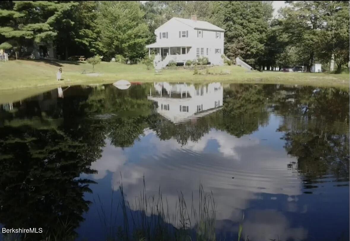 1689 East Windsor Road Windsor, MA 01270 - Photo 57 of 57 a view of a lake with a yard