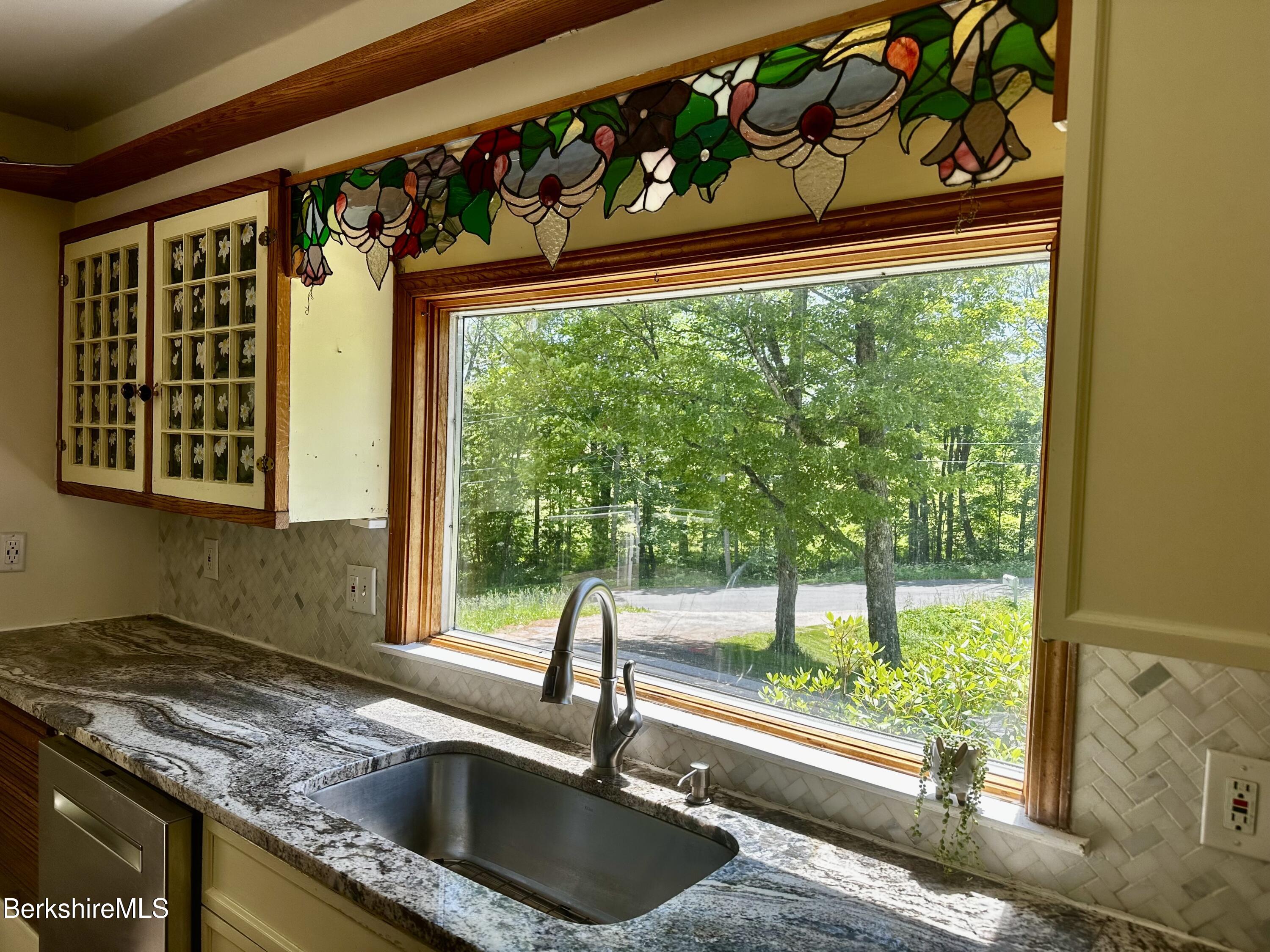 1689 East Windsor Road Windsor, MA 01270 - Photo 8 of 57 a kitchen with a sink a counter top and a window